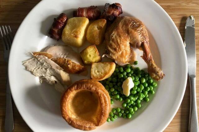 A roast dinner, with a yorkshire pudding