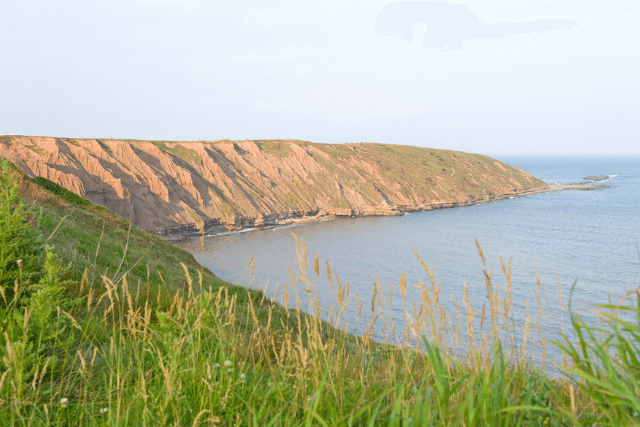 sun shining on Filey Brigg