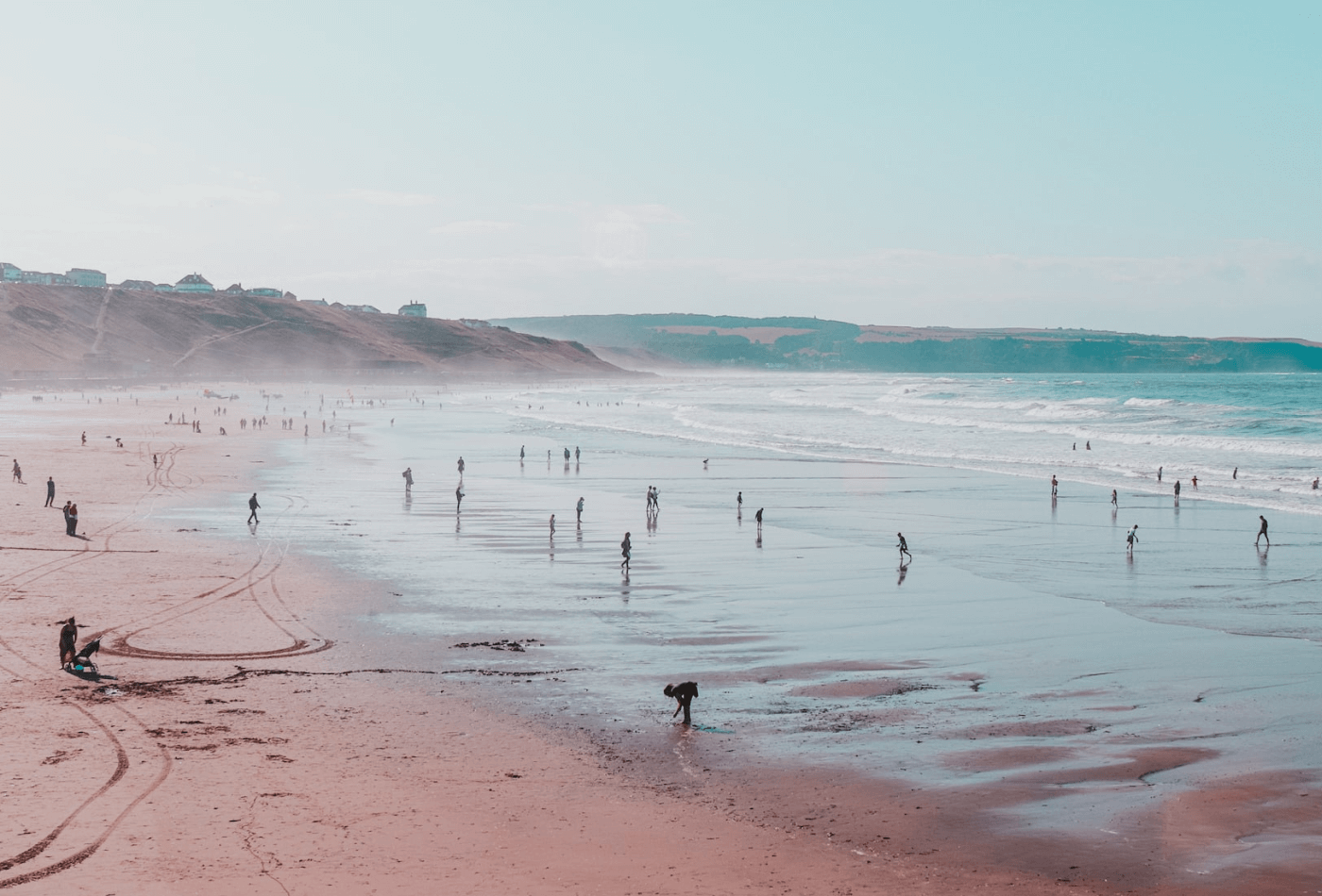 Misty Whitby beach during summer holiday