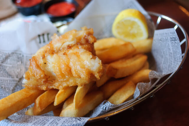 A traditional portion of fish and chips served in a restaurant
