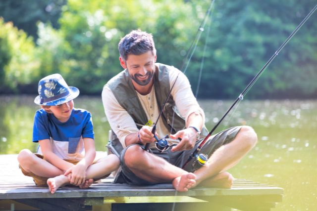 Man and son enjoying a day trip fishing in Yorkshire