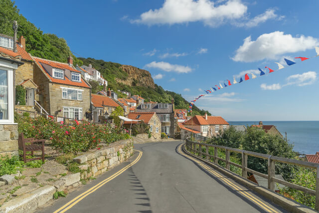 A street running alongside the coast of Runswick Bay