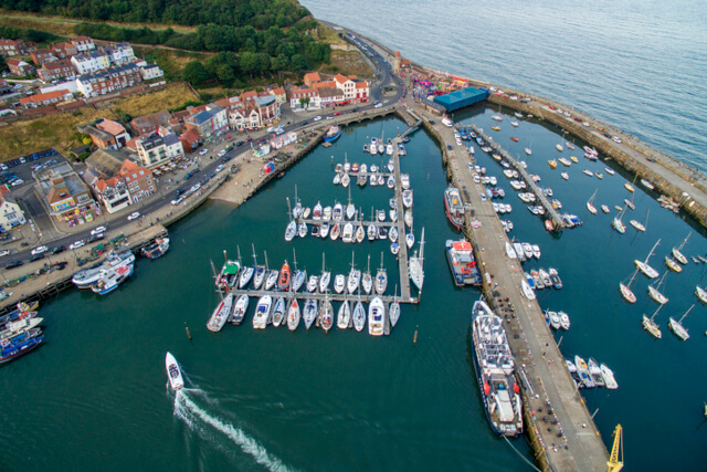 An ariel view of a harbour full of boats in Scarborough