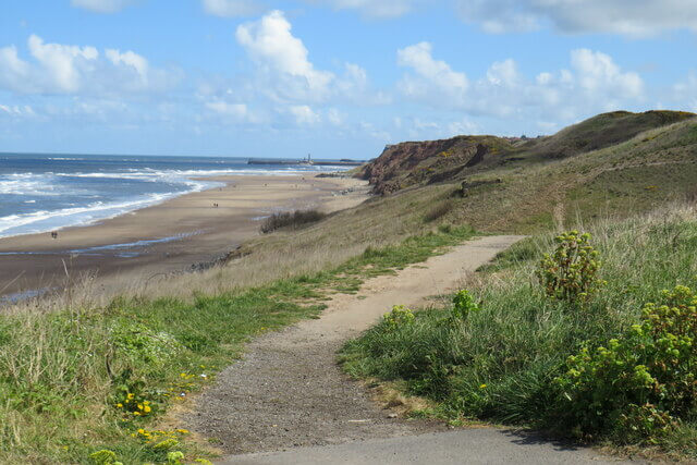 A view across Upgang Beach from the coastal path behind