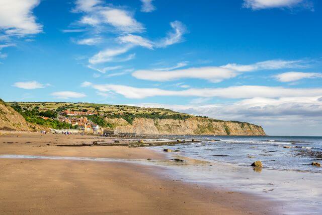 Looking north across Robin Hood's Bay Beach towards the coastal cliffs